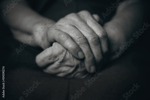 Two hands of an old man
