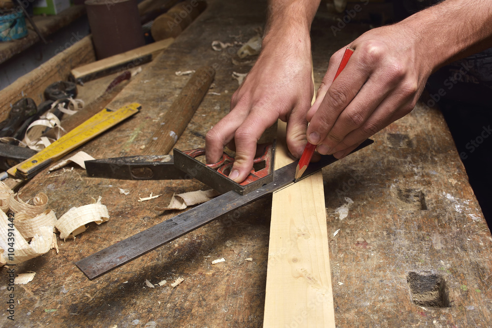 carpenter working with plane on wooden carpenter working with plane on wooden