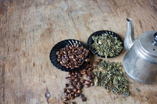 Coffee beans and green tea leaves 