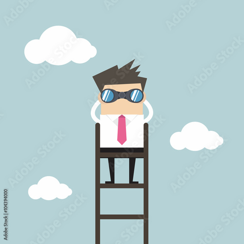 Businessman on a ladder using binoculars above cloud