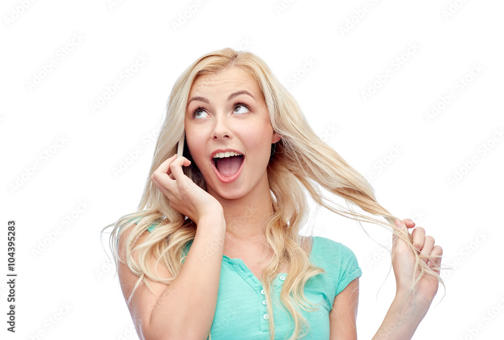 smiling young woman calling on smartphone smiling young woman calling on smartphone