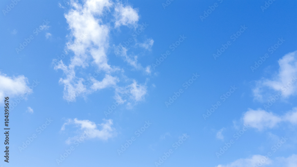 White cloudy and blue background