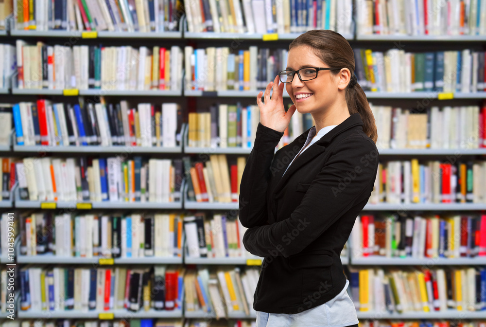 Portrait of a womanin a library Portrait of a womanin a library