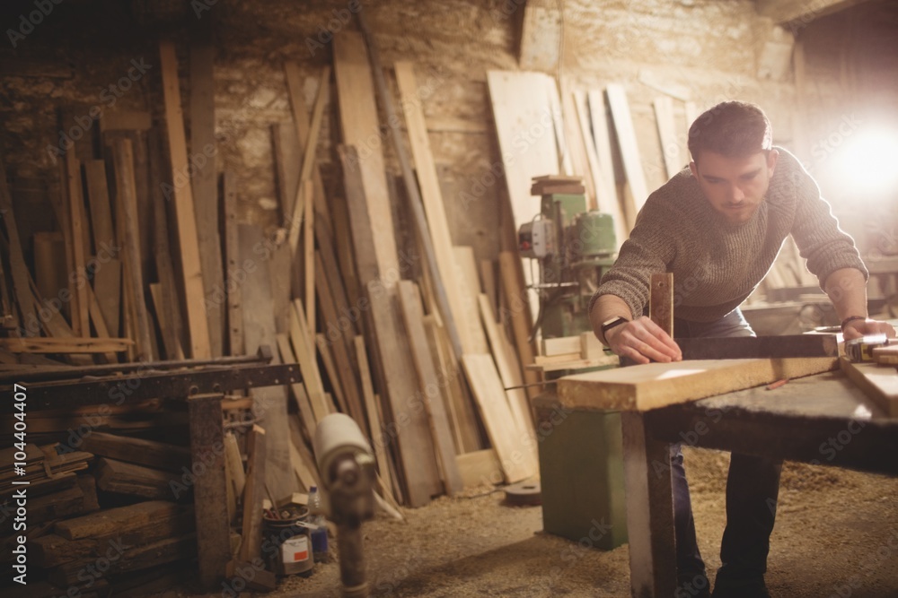 Carpenter working in workshop Carpenter working in workshop
