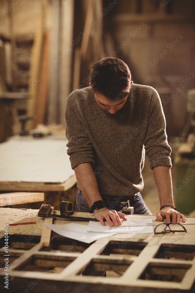 Carpenter working on his craft Carpenter working on his craft