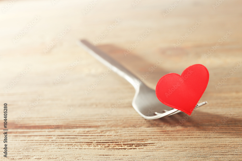 Concept image for Valentines Day dining, on wooden background Concept image for Valentines Day dining, on wooden background
