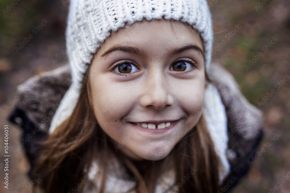Portrait of smiling girl wearing wooly hat Portrait of smiling girl wearing wooly hat