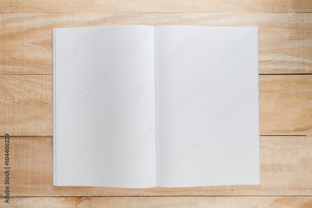 Blank paper or book mock up on wood background Blank paper or book mock up on wood background