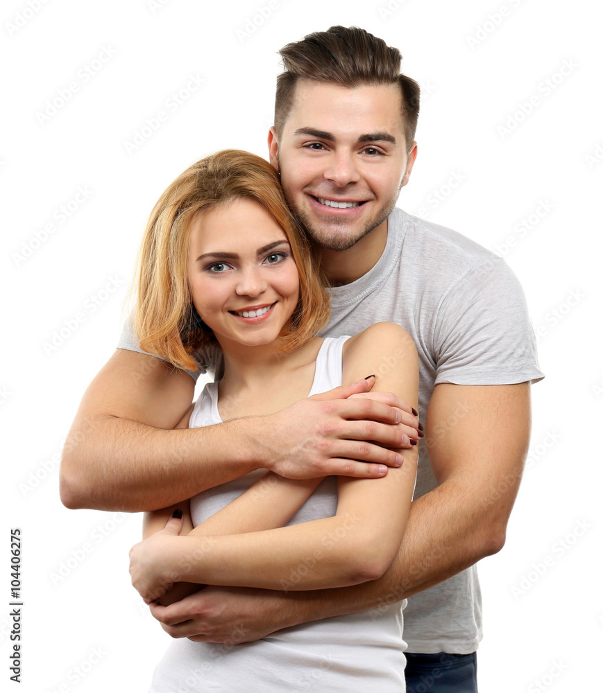Young couple in love embracing, isolated on white Young couple in love embracing, isolated on white