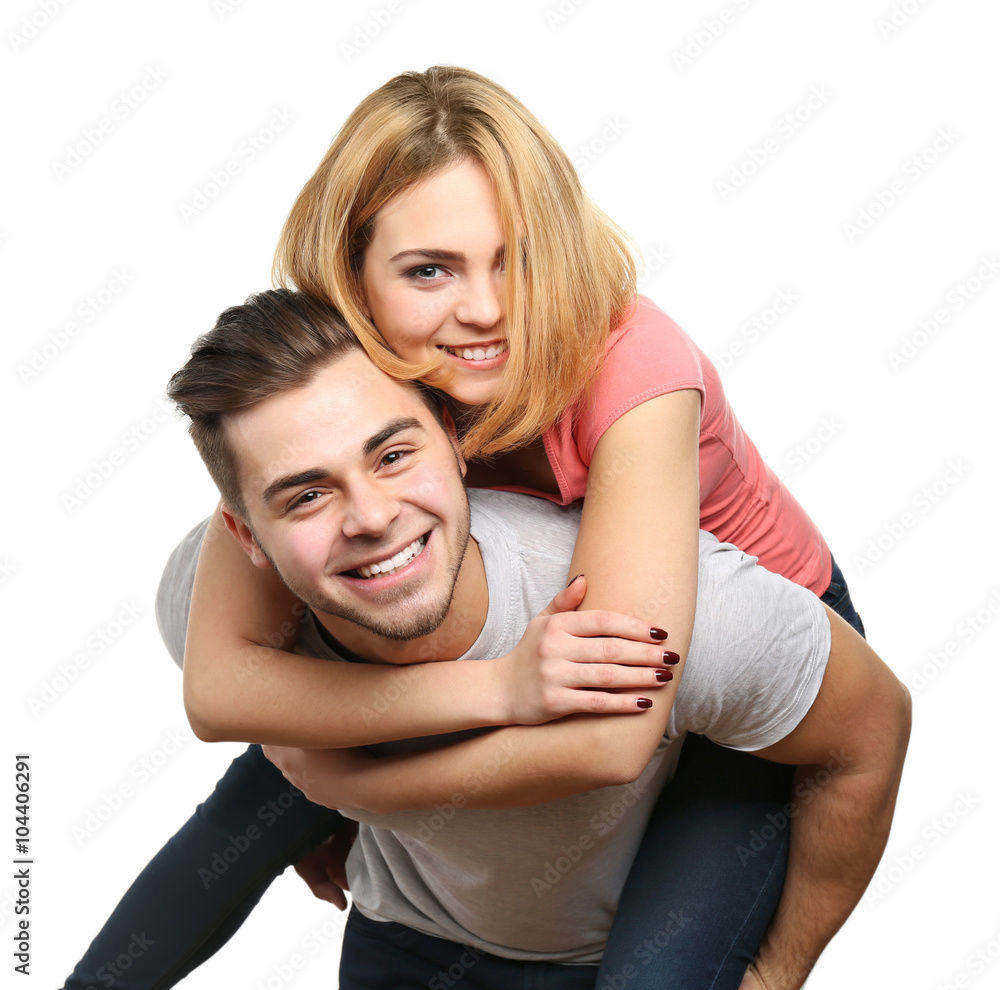 Young couple in love embracing, isolated on white Young couple in love embracing, isolated on white
