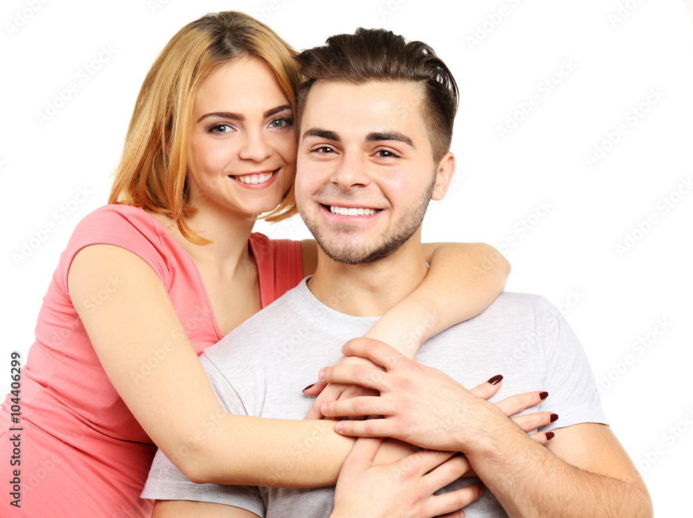 Young couple in love embracing, isolated on white Young couple in love embracing, isolated on white