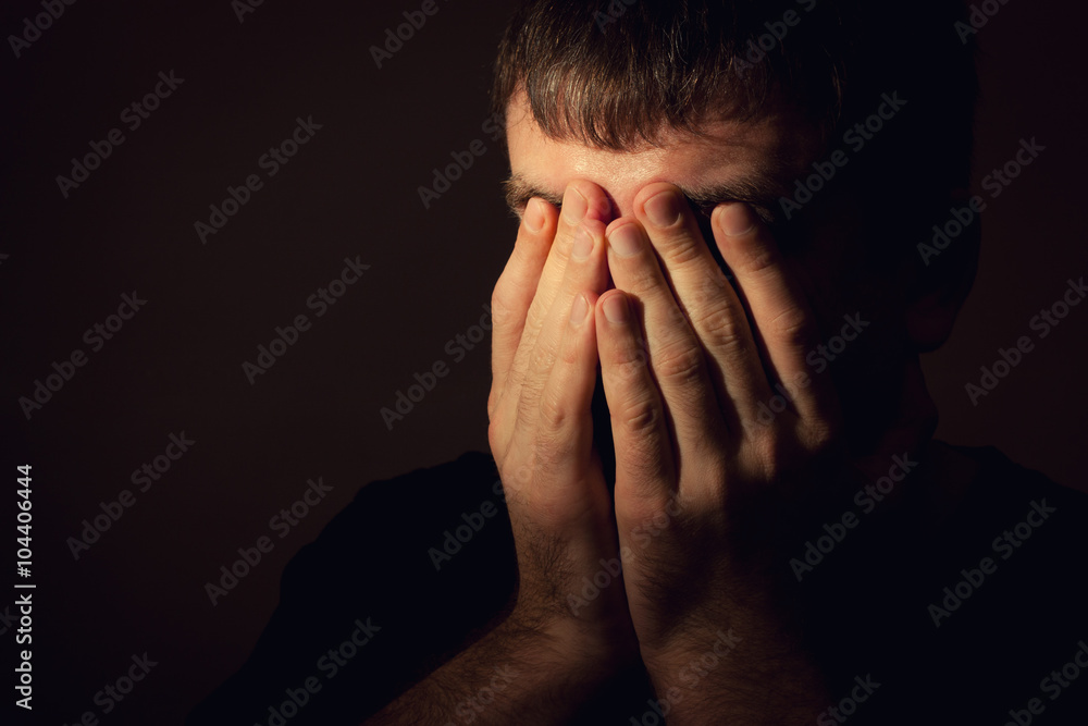 Man in depression, hands covered his face Man in depression, hands covered his face