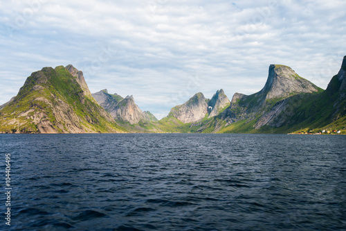 Daily view of amazing mountains near water in Lofoten islands, Norway