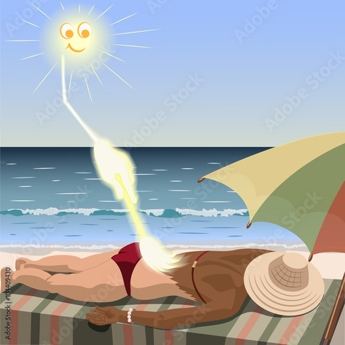 Sun creates tan for woman who lies on the beach. Sun draws suntan