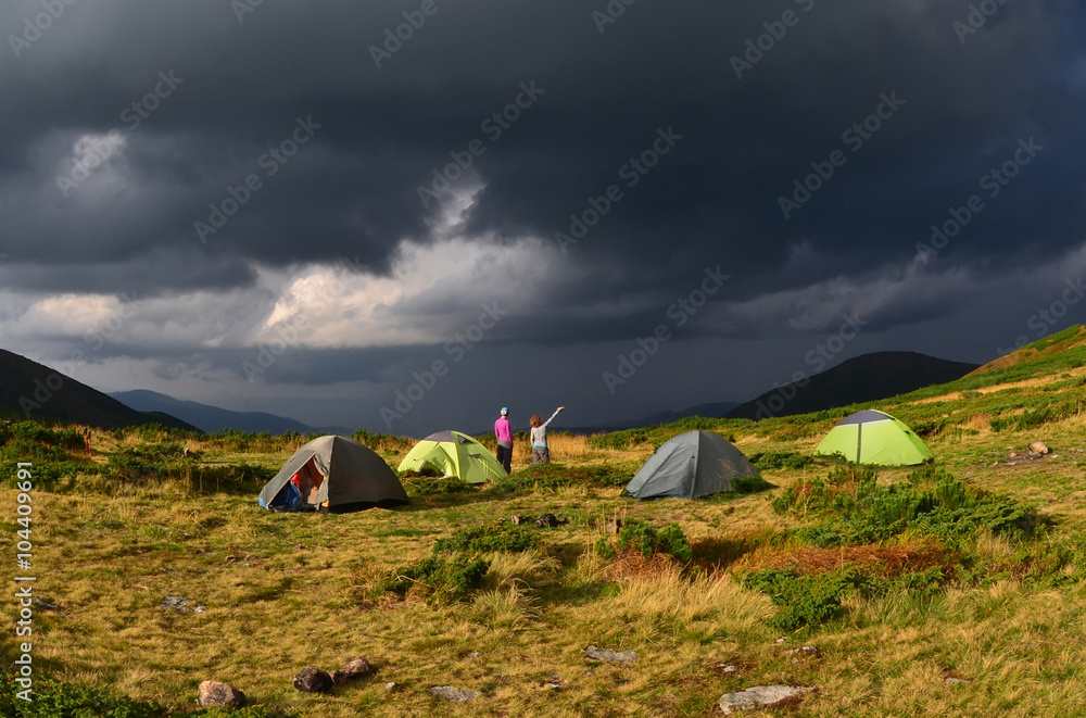 Tourist tents in mountains in storm,Carpathian ,Ukraine