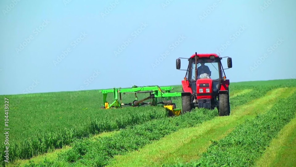 View of harvest fields with combine