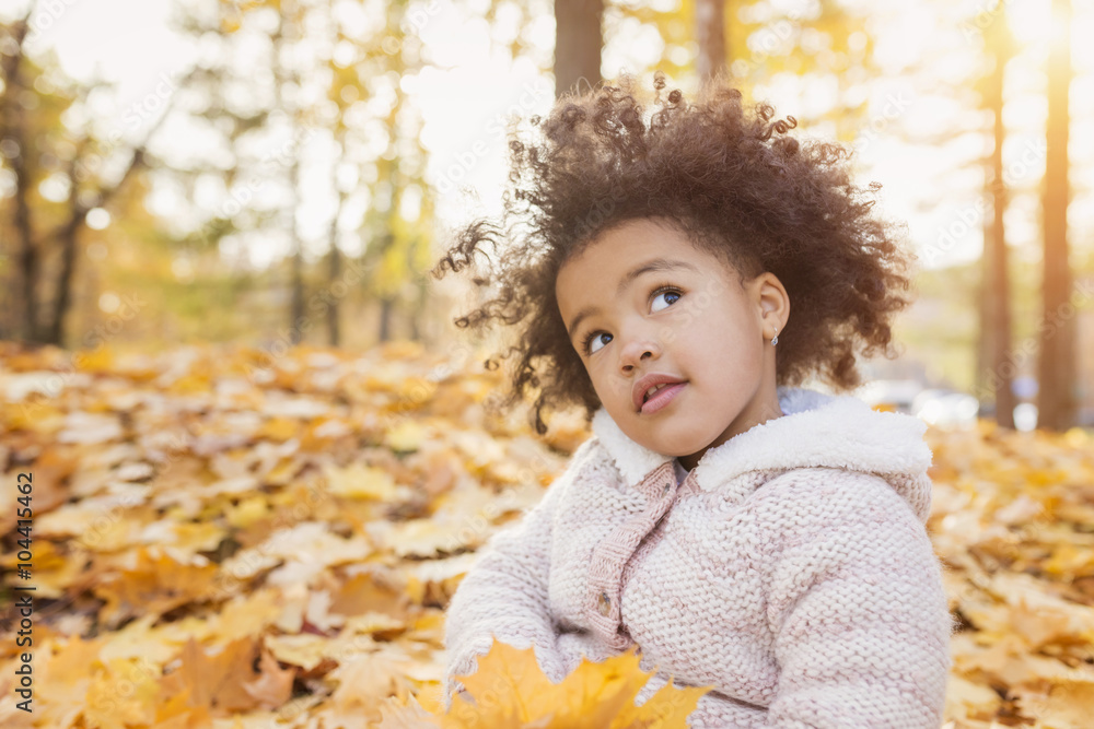 Little girl playing in autumn park Little girl playing in autumn park