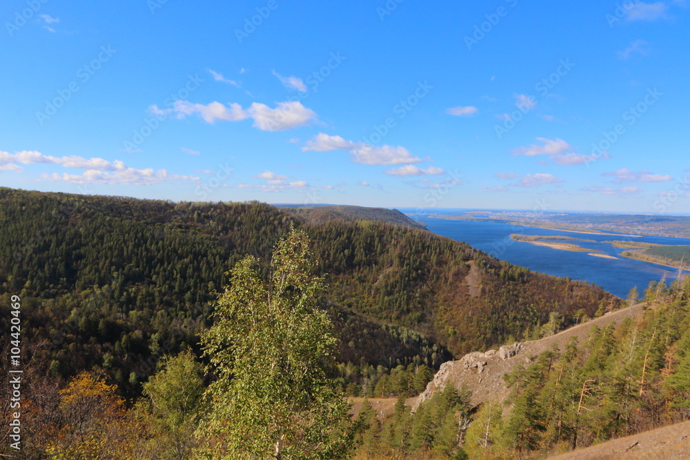 View from Strelnaya Mountain at Zhiguli Mountains and the Volga River against a blue sky