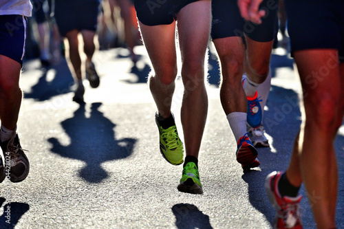Runners in bright light