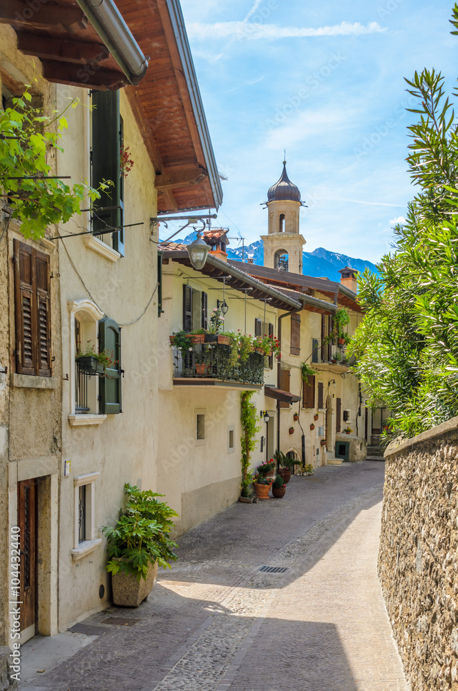 Picturesque small town street view in Limone, Lake Garda Italy.