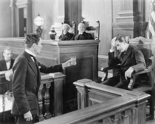 Lawyer and a witness in a courtroom 