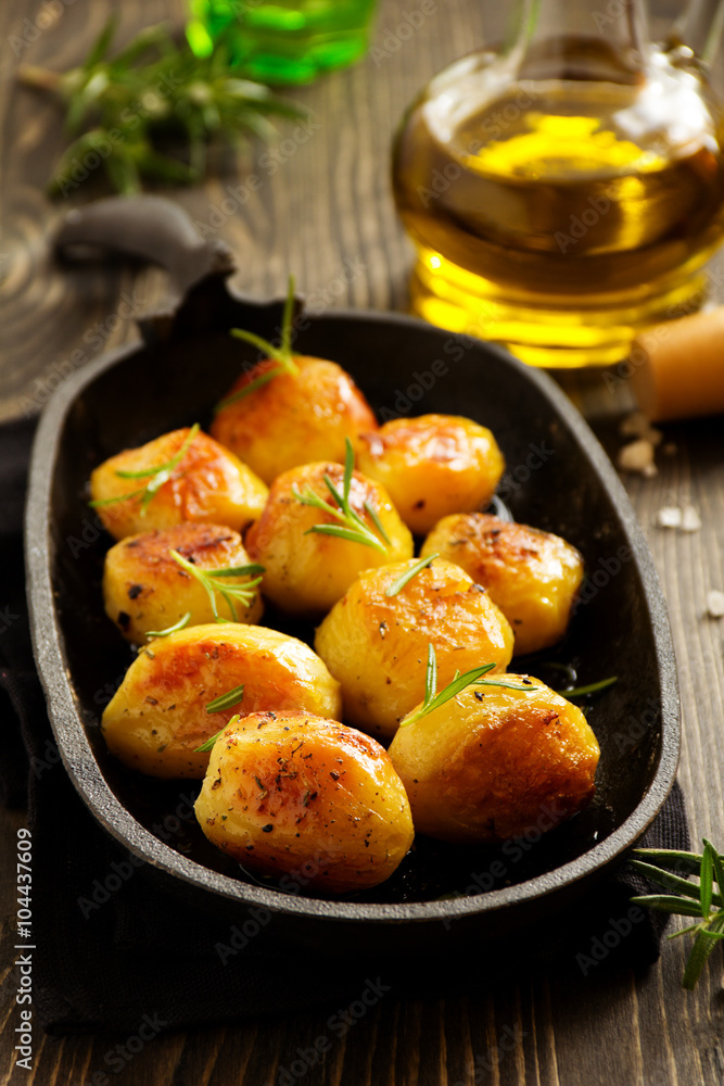 Baked potatoes with rosemary. Baked potatoes with rosemary.
