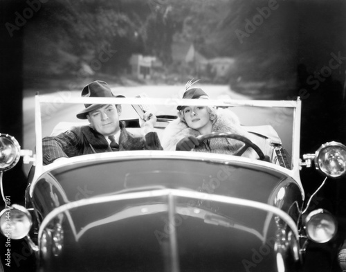 Couple driving a car  photo
