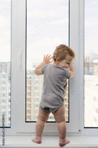 Child looking at window