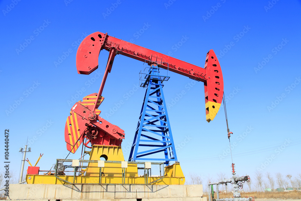 Oil field, oil pump in the work Oil field, oil pump in the work