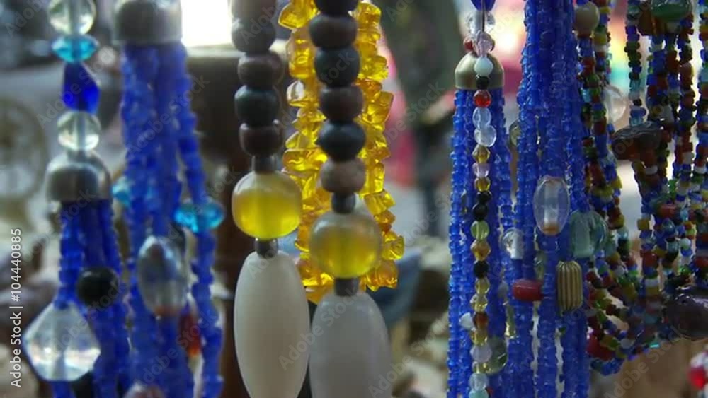 Necklaces on stand at shop in India Necklaces on stand at shop in India