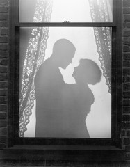 Silhouette of a couple embracing 