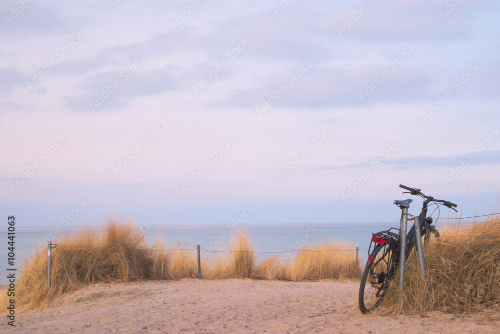 Beach of baltic sea with bicycle