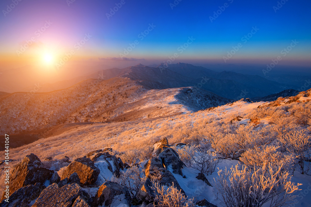 Obraz premium Sunrise on Deogyusan mountains covered with snow in winter,South