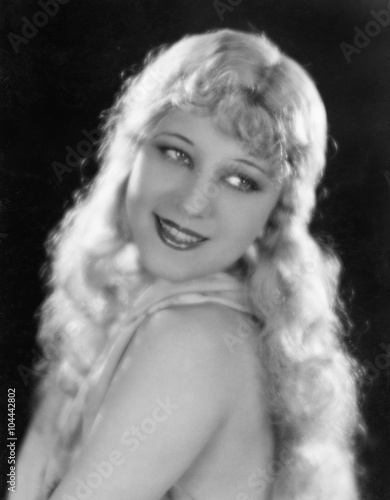 Fototapeta Naklejka Na Ścianę i Meble -  Portrait of a woman with long blond hair 