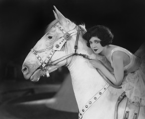 Woman riding horse 