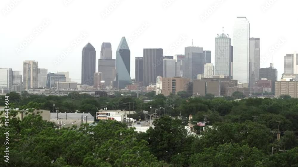 Medium wide shot of Dallas skyline with hazy sky. Medium wide shot of Dallas skyline with hazy sky.