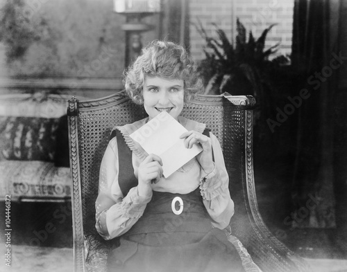 Excited woman with letter 