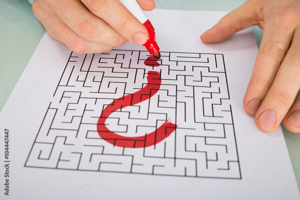 Person Hand With Question Mark On Maze Person Hand With Question Mark On Maze