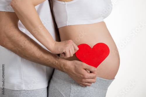 Wallpaper Mural Pregnant Woman With Husband Holding Heart Shape Torontodigital.ca