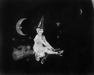 With the man in the moon and a witch on a broom, a flight of fantasy lights the night sky 