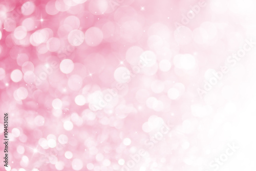 Pink ray bokeh glitter defocused lights abstract background.