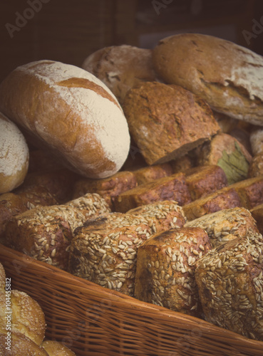 Vintage photo, Freshly baked traditional loaves of rye bread on stall