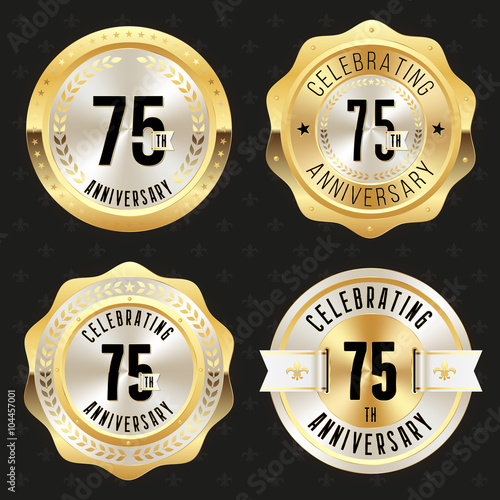 Collection of gold  75th anniversary badges on black background