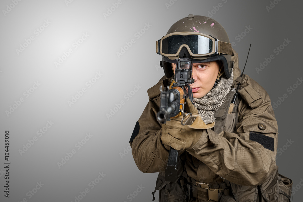 Soldier aiming a rifle at you