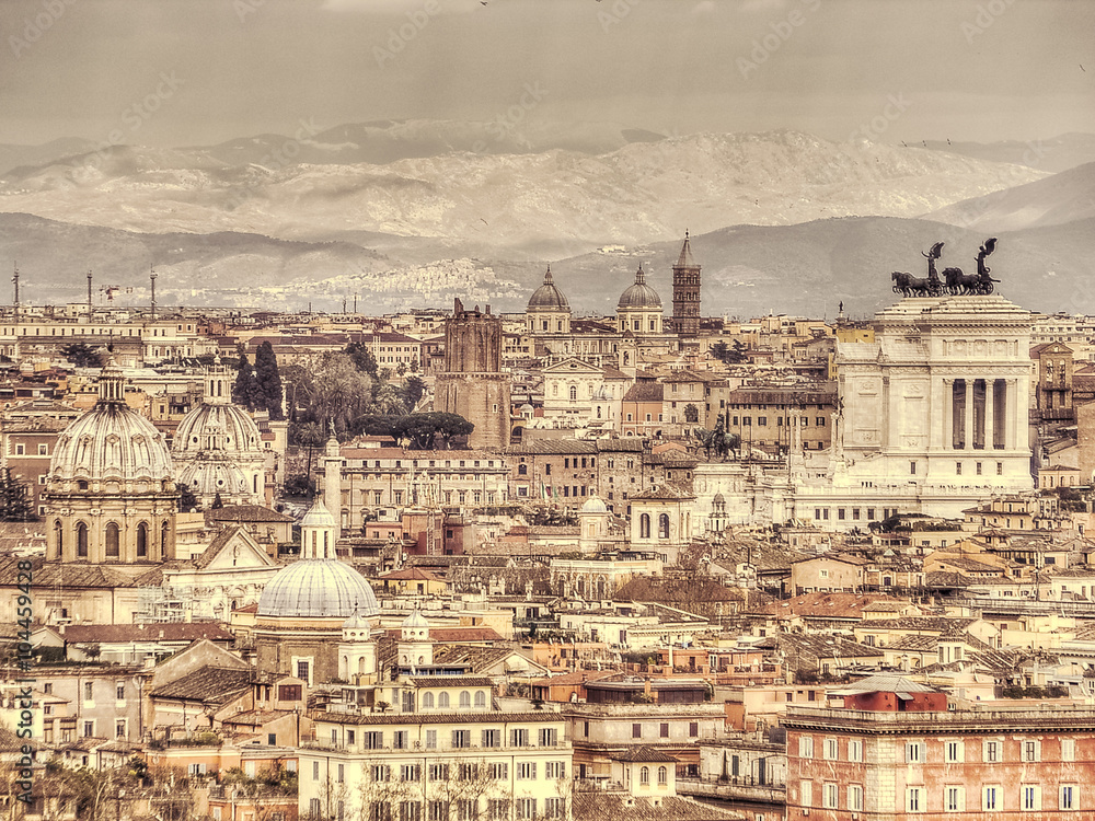 Panoramic view of Rome on the background of mountains. Retro toned photo