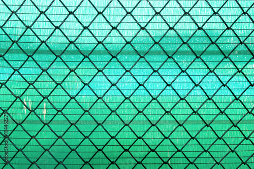 Steel Wire mesh on green slan background