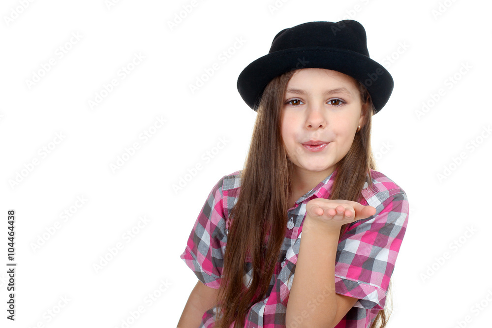 sweet and beautiful little girl in a black hat sending a kiss isolated on white background sweet and beautiful little girl in a black hat sending a kiss isolated on white background