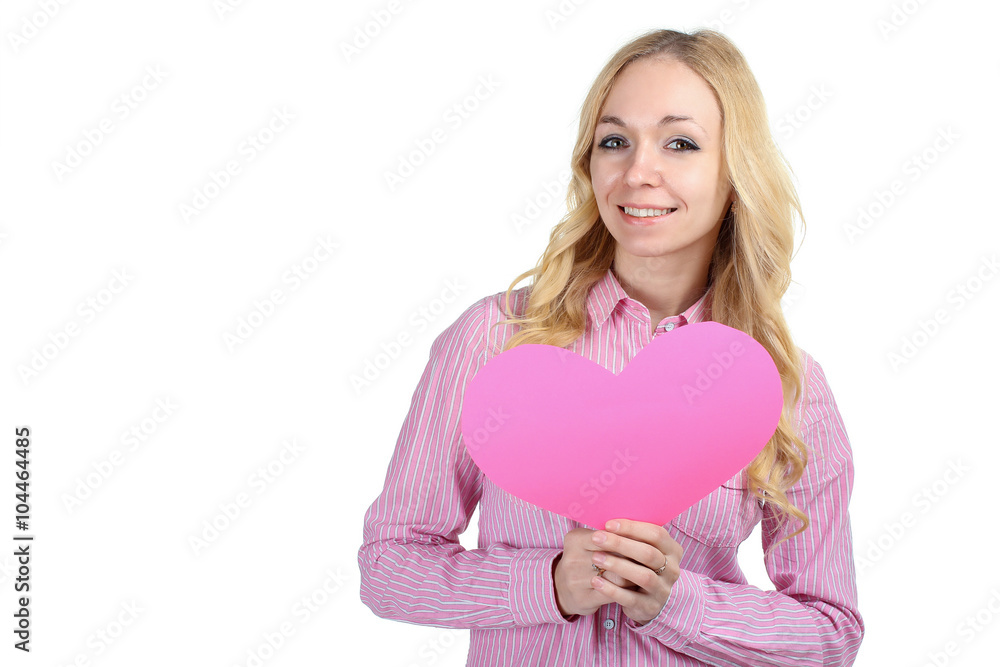 sweet and beautiful girl holding a large pink paper heart on a white isolated background sweet and beautiful girl holding a large pink paper heart on a white isolated background