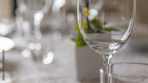 Empty wineglass on a white tableware