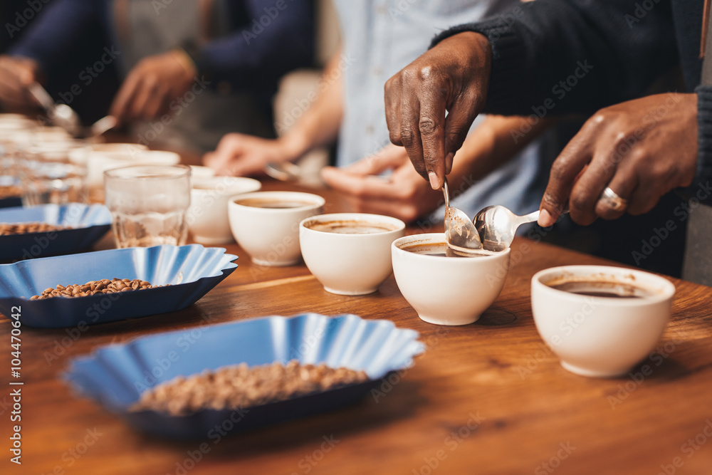 Baristas training to make the perfect cup of coffee Baristas training to make the perfect cup of coffee